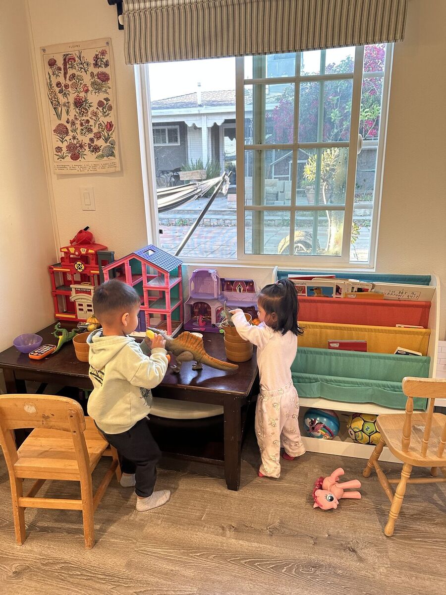 Children building with magnetic tiles